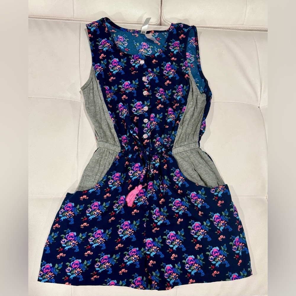 Girls blue flower romper with pockets. Never worn. Crystal embellished buttons